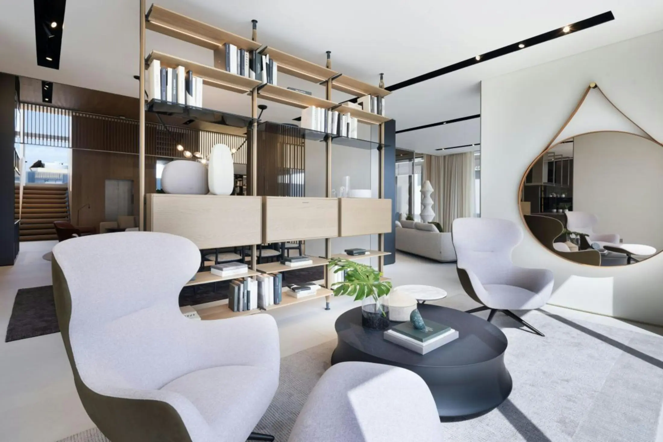 Refined lounge with sculptural seating, bespoke shelving and layered neutral finishes